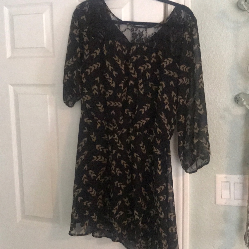Black dress with gold arrows